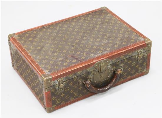 A Louis Vuitton travel case, 19.75 x 14.5 x 7in.